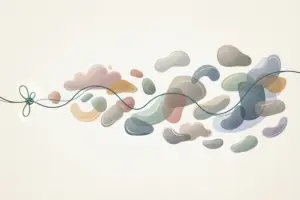 A single thin thread trailing from a small knot into a loose scatter of disconnected, softly colored shapes.