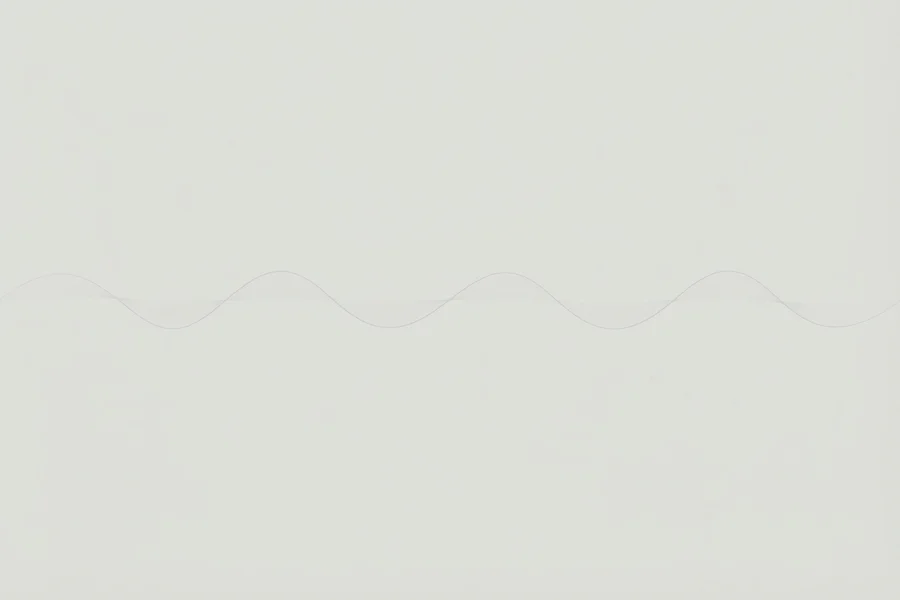 Ilustración de una línea ondulada muy tenue y casi invisible, apenas trazada sobre un fondo claro y uniforme.