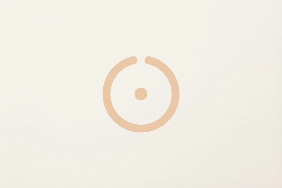 A simple pale ring drawn as two open arcs, with a small dot resting at its center.